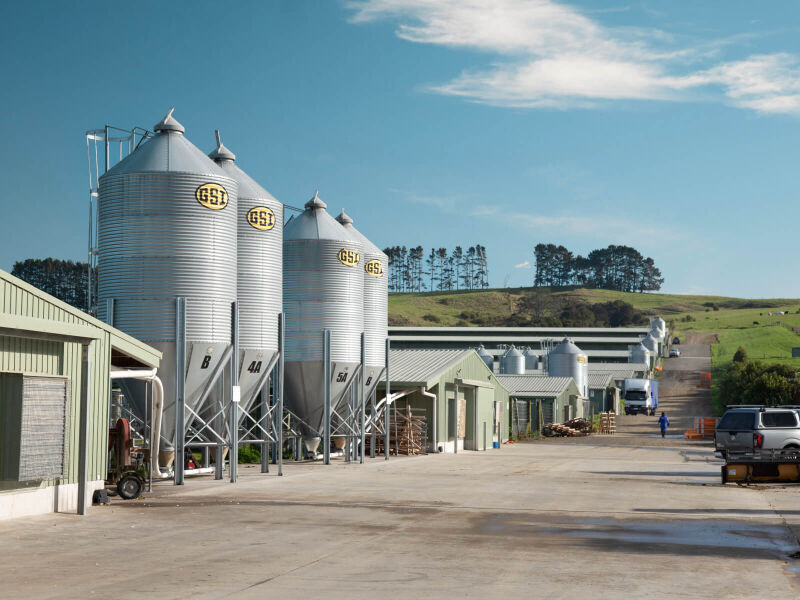 Feed silos and rearing sheds at Maketu Poultry Farms